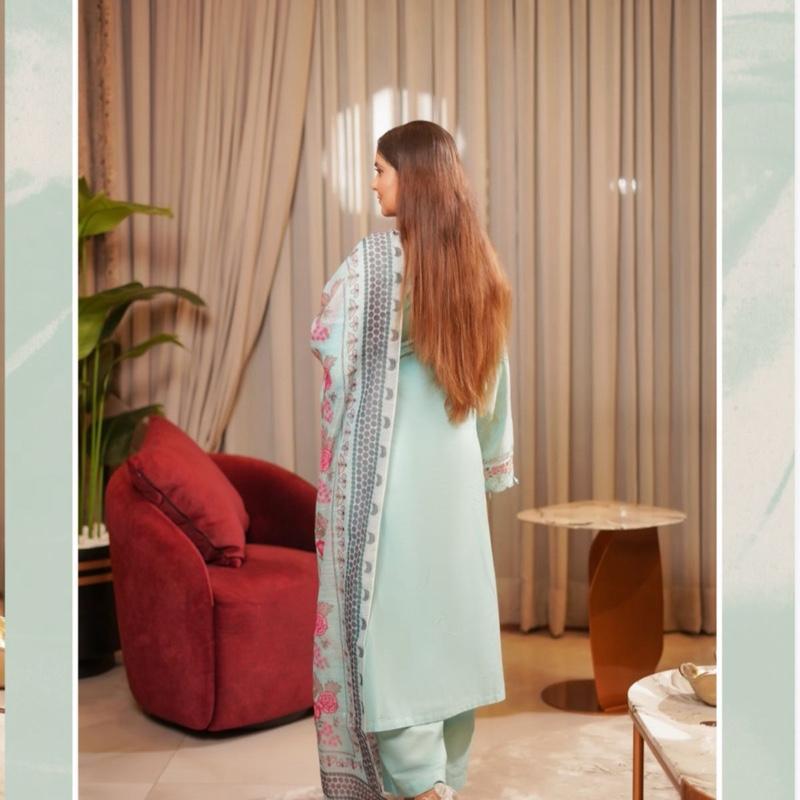 Munira ice blue lawn  heavy embroidered 3PC suit