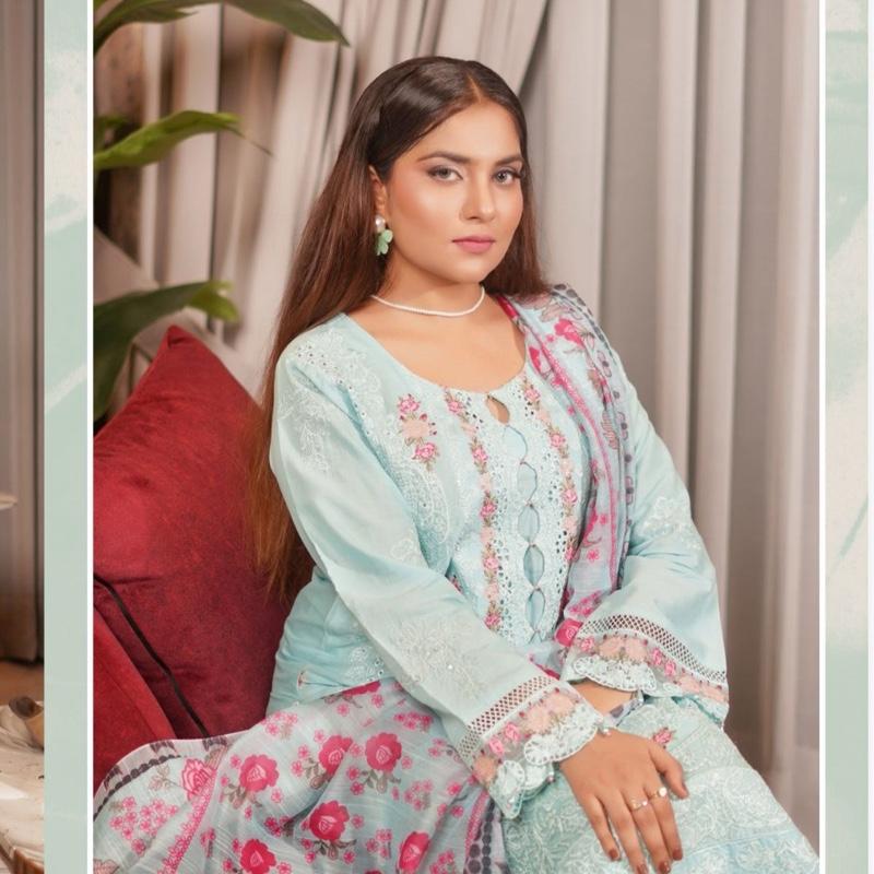 Munira ice blue lawn  heavy embroidered 3PC suit